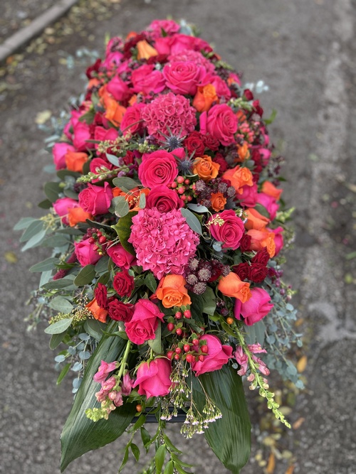 Bright Pink and orange Coffin Spray 